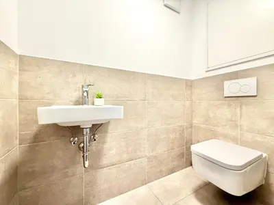 Ein Badezimmer in der Unterkunft Penthouse Wien mit Parkplatz und Balkon