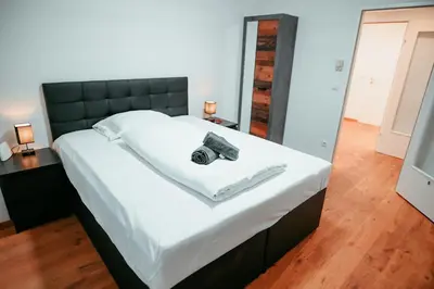 Ein Bett oder Betten in einem Zimmer der Unterkunft Vienna Shopping Center 6a Apartment