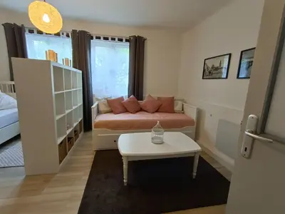 Ein Bett oder Betten in einem Zimmer der Unterkunft Ferienwohnung Strohblume