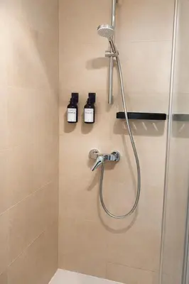 Ein Badezimmer in der Unterkunft Suites in Mödling