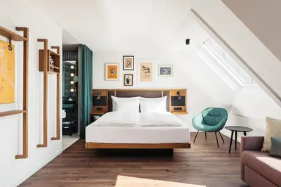 Ein Bett oder Betten in einem Zimmer der Unterkunft Hotel Schani UNO City