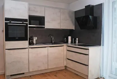 Küche/Küchenzeile in der Unterkunft Cozy & Stylish Appartment in Vienna - 1 min to U3 Metro - Quiet Area with Shops nearby
