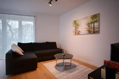 Ein Sitzbereich in der Unterkunft Cozy & Stylish Appartment in Vienna - 1 min to U3 Metro - Quiet Area with Shops nearby