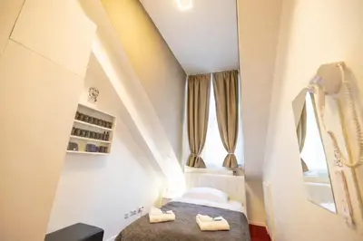 Ein Bett oder Betten in einem Zimmer der Unterkunft DATRI Petite Suite 4