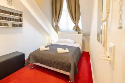 Ein Bett oder Betten in einem Zimmer der Unterkunft DATRI Petite Suite 4