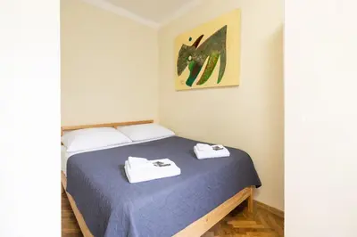 Ein Bett oder Betten in einem Zimmer der Unterkunft DATRI Petite Suite 10