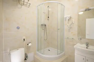 Ein Badezimmer in der Unterkunft DATRI Petite Suite 10