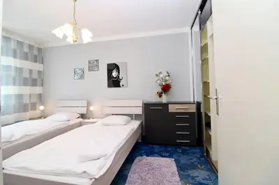 Ein Bett oder Betten in einem Zimmer der Unterkunft Cozy Apartment FREE parking