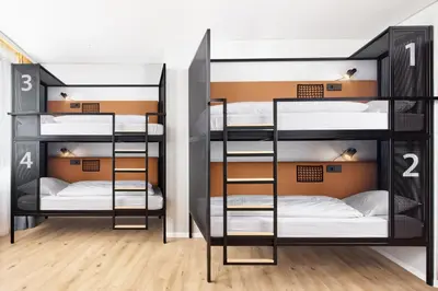 Ein Bett oder Betten in einem Zimmer der Unterkunft H2 Hotel Wien Schönbrunn