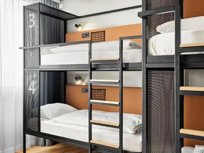 Ein Bett oder Betten in einem Zimmer der Unterkunft H2 Hotel Wien Schönbrunn