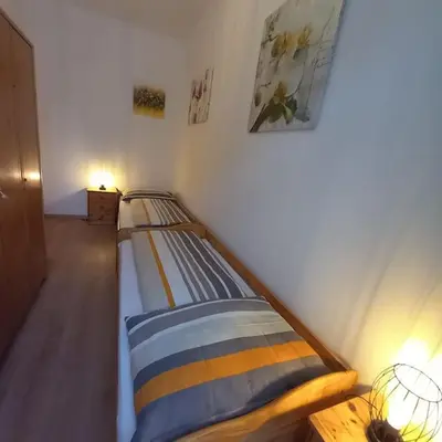 Ein Bett oder Betten in einem Zimmer der Unterkunft Altbauwohnung neu saniert - für Familien geeignet