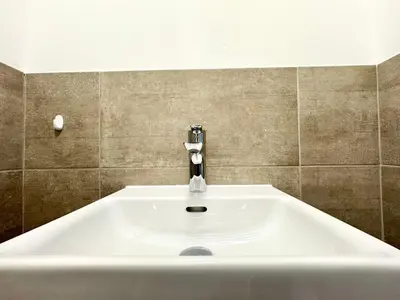 Ein Badezimmer in der Unterkunft Möblierte Wohnung + Parkplatz und Terrasse