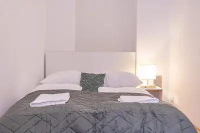 Ein Bett oder Betten in einem Zimmer der Unterkunft Comfortable 2-Bedroom Apartment in Vienna