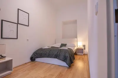 Ein Bett oder Betten in einem Zimmer der Unterkunft Comfortable 2-Bedroom Apartment in Vienna