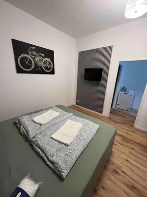 Ein Bett oder Betten in einem Zimmer der Unterkunft RRooms Smart Appartement