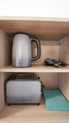 Kaffee-/Teezubehör in der Unterkunft CozyNite Premium Apartment Hernals 1