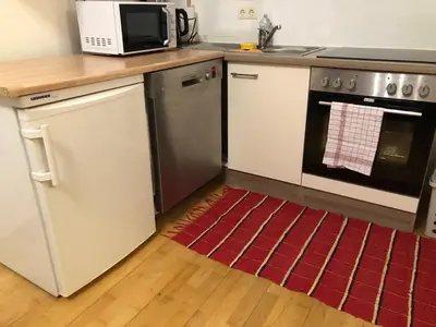Küche/Küchenzeile in der Unterkunft CozyNite Premium Apartment Hernals 1