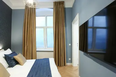 Ein Bett oder Betten in einem Zimmer der Unterkunft Pink Grapefruit City Condo