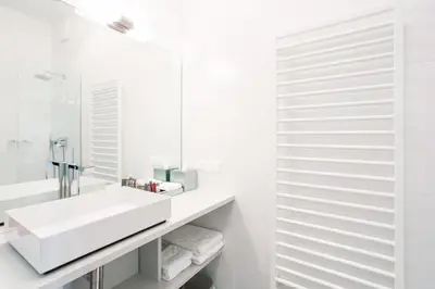Ein Badezimmer in der Unterkunft Pink Grapefruit City Condo