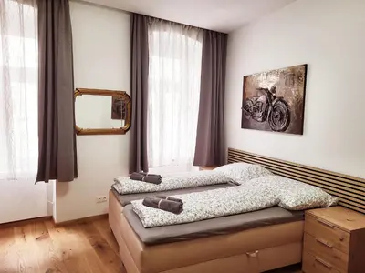 Ein Bett oder Betten in einem Zimmer der Unterkunft Winning Apartments