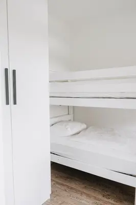 Ein Bett oder Betten in einem Zimmer der Unterkunft Kleine Seezeit