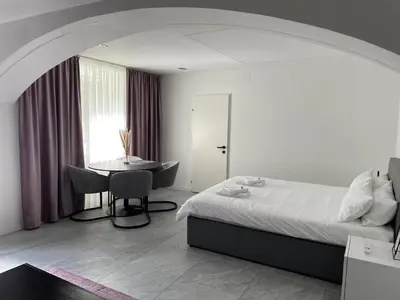 Ein Bett oder Betten in einem Zimmer der Unterkunft Hagenauer House