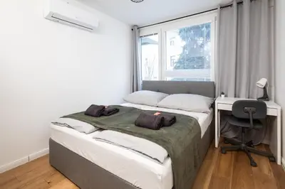 Ein Bett oder Betten in einem Zimmer der Unterkunft Family Apartment