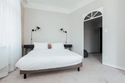 Ein Bett oder Betten in einem Zimmer der Unterkunft Hotel Babula am Augarten