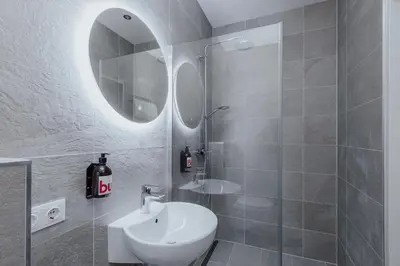Ein Badezimmer in der Unterkunft Hotel Babula am Augarten