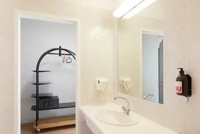 Ein Badezimmer in der Unterkunft Hotel Babula am Augarten