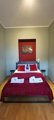 Ein Bett oder Betten in einem Zimmer der Unterkunft Magnolia- Dolce Duo Homes