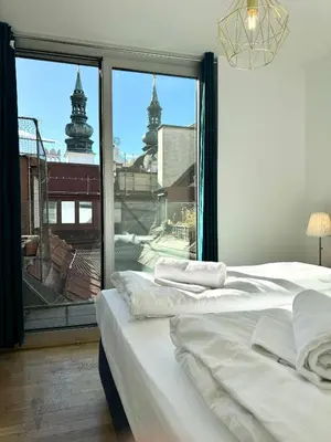 Ein Bett oder Betten in einem Zimmer der Unterkunft Residential Elegance: YourVienna Classic Apartments in City Center