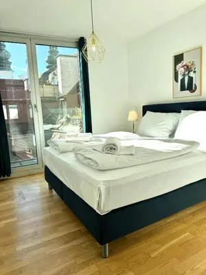 Ein Bett oder Betten in einem Zimmer der Unterkunft Residential Elegance: YourVienna Classic Apartments in City Center