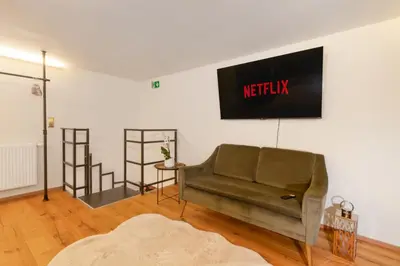 TV/Unterhaltungsangebot in der Unterkunft Zentral - Netflix - 2 Stöcke - Arbeitsplatz