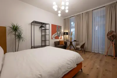 Ein Bett oder Betten in einem Zimmer der Unterkunft Stylish central 1-bedroom apartment with a terrace
