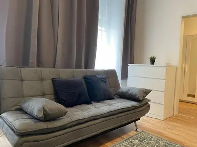 Ein Sitzbereich in der Unterkunft Modern Apartment near City Center 1BR