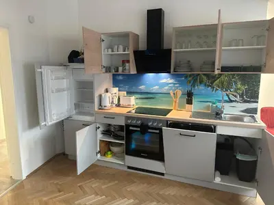 Küche/Küchenzeile in der Unterkunft Klimatisiertes Dachgeschoss City Apartment in Zentrum Wiens