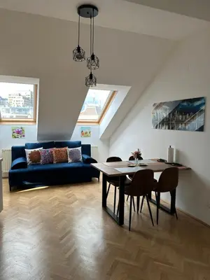 Ein Sitzbereich in der Unterkunft Klimatisiertes Dachgeschoss City Apartment in Zentrum Wiens