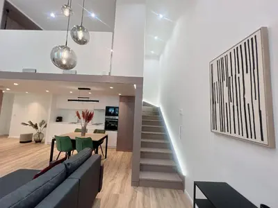 Ein Sitzbereich in der Unterkunft Zeus Design Loft Apartments Braunhirschen