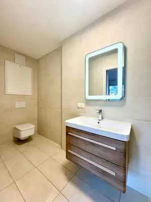 Ein Badezimmer in der Unterkunft Sunshine Apartment mit Terrasse