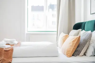 Ein Bett oder Betten in einem Zimmer der Unterkunft City Chic #11