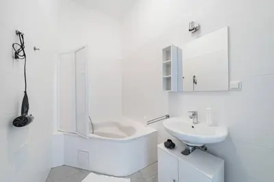 Ein Badezimmer in der Unterkunft City Chic #11