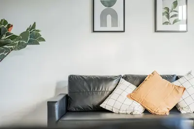 Ein Sitzbereich in der Unterkunft City Chic #11