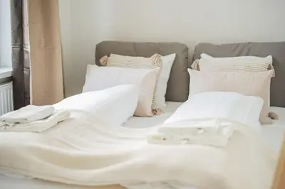 Ein Bett oder Betten in einem Zimmer der Unterkunft City Chic #18