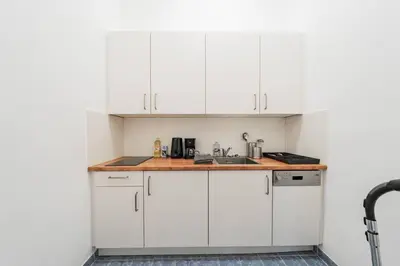 Küche/Küchenzeile in der Unterkunft City Chic #18