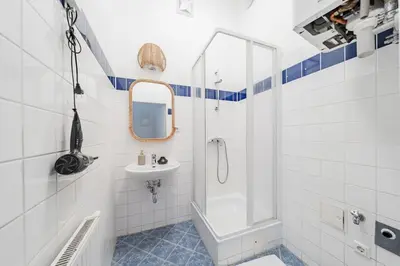Ein Badezimmer in der Unterkunft City Chic #18
