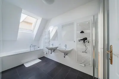 Ein Badezimmer in der Unterkunft City Chic #20