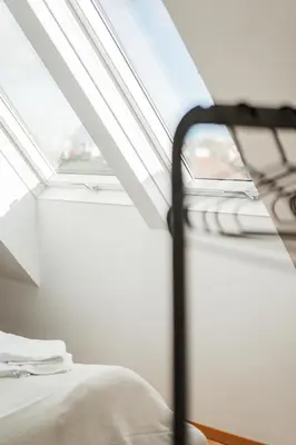 Ein Bett oder Betten in einem Zimmer der Unterkunft City Chic #20