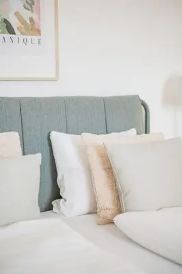 Ein Bett oder Betten in einem Zimmer der Unterkunft City Chic #21