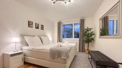 Ein Bett oder Betten in einem Zimmer der Unterkunft Charming, modern & spacious Apartment